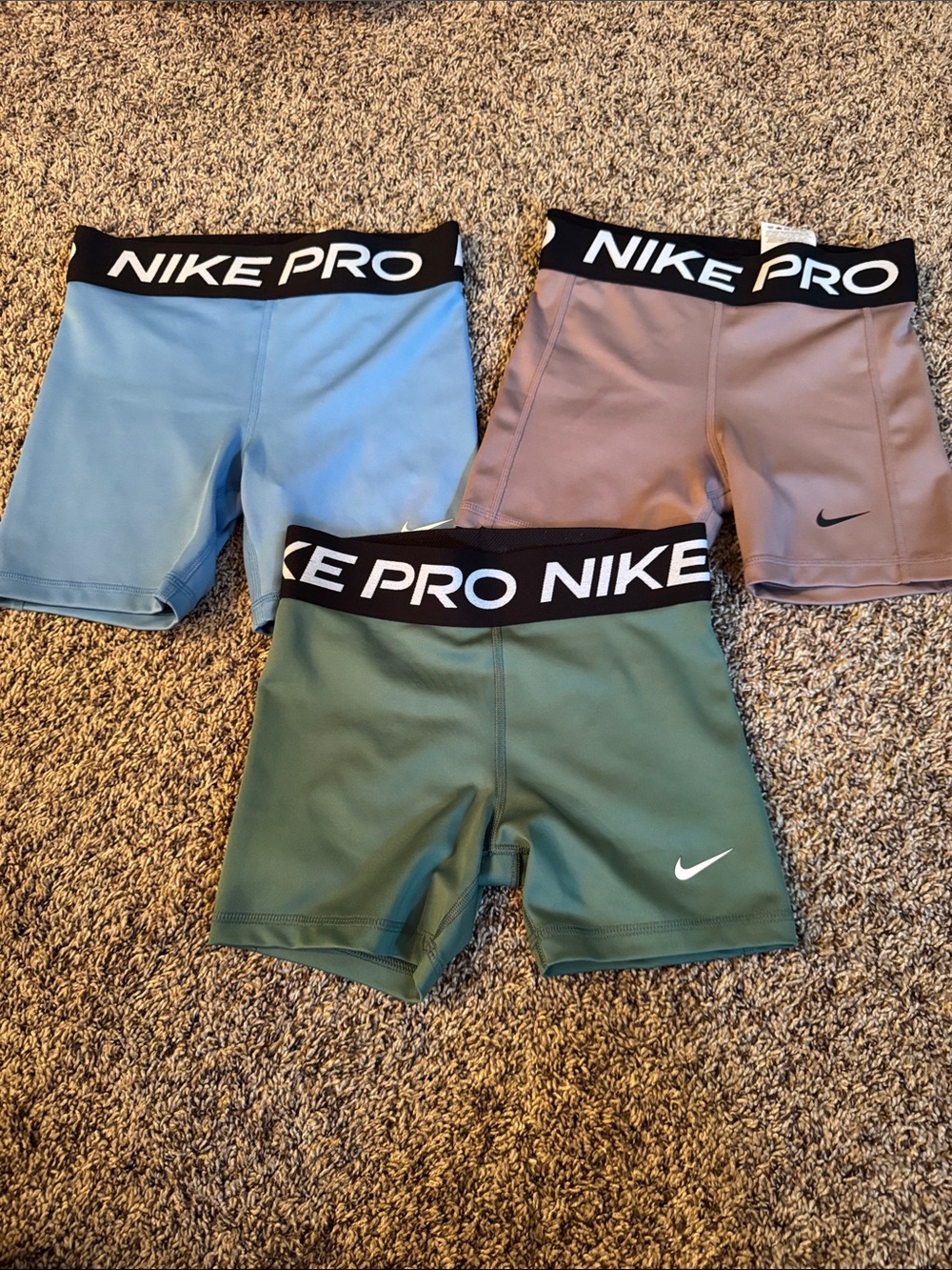 Nike Kids Pro Shorts in Blue, Green, and Mauve